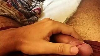 skinny brazilian jerks huge cock moaning to orgasm on bed