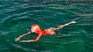 naked girl splashing in blue water 💦😏