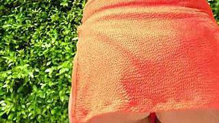 orange bikini babe flashes her curves in public thrill