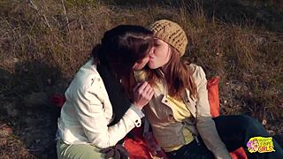 A couple of tattooed brunettes hike face sit lick strap fuck outdoors wild
