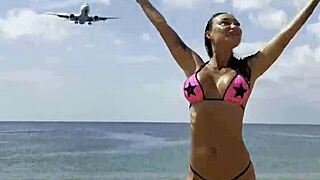 Monika Fox poses sexy in pink starry bikini on beach 🏖️⭐