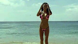 Monika Fox poses sexy in pink starry bikini on beach 🏖️⭐