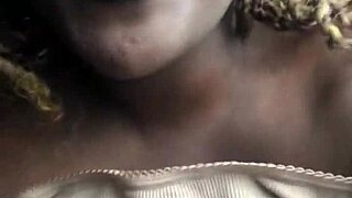 Pretty petite ebony teases hairy pussy feet before riding huge dildo creamy
