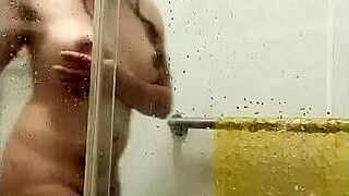 What if Asian ladyboy's huge cock grinds shower glass?