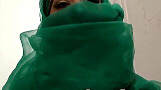 Arab babe slurps massive black cock at gloryhole