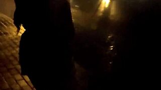 Leyne Rodriguez kneels in rain giving skinny best friend deep sloppy blowjob