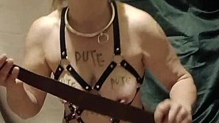 French milf slave chained in harness masturbates publicly doggystyle. Outdoor bdsm humiliation with toys.
