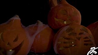 vampire babe in halloween costume teases with big boobs and lingerie reveal.
