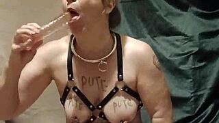 French milf slave chained in harness masturbates publicly doggystyle. Outdoor bdsm humiliation with toys.