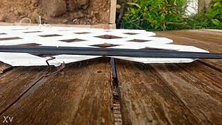 She presses against the fence for intense outdoor fucking session