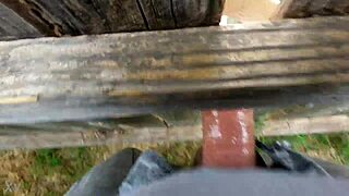 She presses against the fence for intense outdoor fucking session