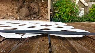 She presses against the fence for intense outdoor fucking session