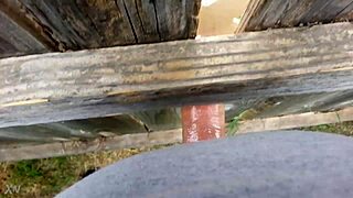 She presses against the fence for intense outdoor fucking session