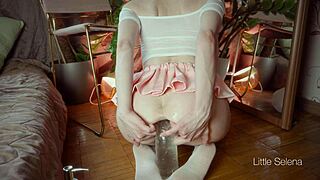 A beautiful petite girl fists her huge gaping ass with toys close up