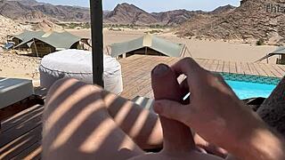 we flashed our big cocks outdoors until massive cumshots hit the desert
