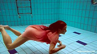 hot russian teen deniska strips naked underwater at the pool.