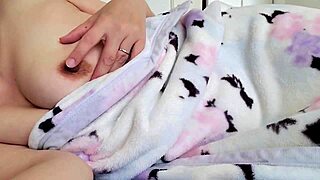 ready to watch this married woman masturbate wildly on the bed?