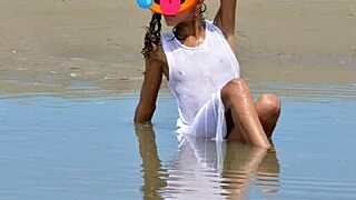 check out this skinny latina model's small tits and nice ass nude on public beach!