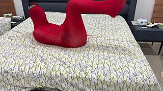 Trapped in tight pantyhose bondage cocoon, she stretches helplessly for master?