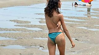 check out this skinny latina model's small tits and nice ass nude on public beach!