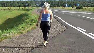 big ass blonde squeezes into tight leather leggings showing off homemade solo tits belly legs nylon curves