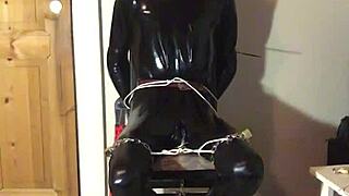 TRIM MASKED LATEX BONDED IN HANDCUFFS COSTUME PLAY