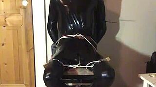 TRIM MASKED LATEX BONDED IN HANDCUFFS COSTUME PLAY