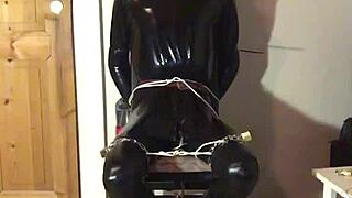 TRIM MASKED LATEX BONDED IN HANDCUFFS COSTUME PLAY