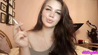 Xo Bunny blows smoke in your face while brunette Latina mistress dominates