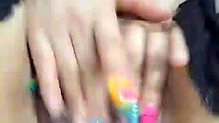 la coneja squirts multiple times with toy and fingers