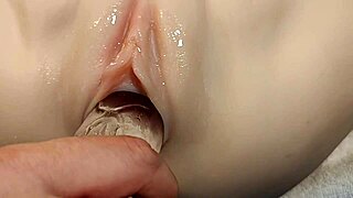 Sex Doll's Shaved Pussy Stuffed with Double Fake Cocks Close-Up