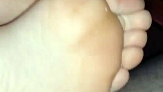 girlfriend's bare feet stroke to huge homemade load