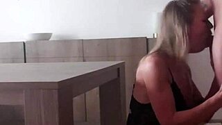 she's bent over desk in boots taking cumshot doggystyle.