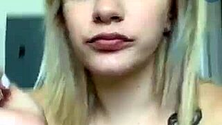 Blonde teen webcam girl goes topless flashing her big ass and tits