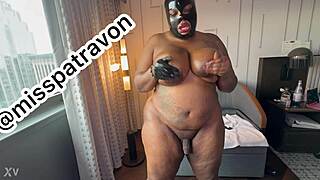 ebony bbw shemale with 70-inch fat ass jerks monster cock in latex hood