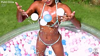 putri cinta strips nude by indonesian pool showing pussy