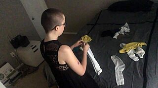 bald girl folding laundry konmari style... ignoring you completely 😏