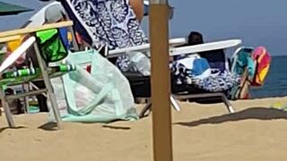 candid shots catch this bikini slut teasing ass on beach