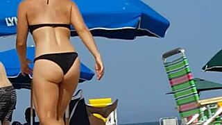candid shots catch this bikini slut teasing ass on beach