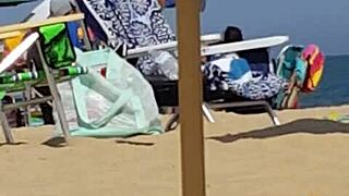 candid shots catch this bikini slut teasing ass on beach