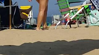 candid shots catch this bikini slut teasing ass on beach