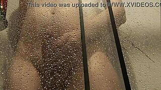 He strokes monster cock then shoots steamy shower jizz