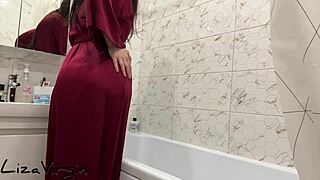 Brunette milf masturbates wet pussy in steamy bathroom