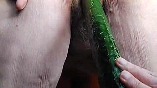 Granny fucks her hairy german beaver with thick cucumber deep