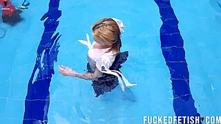 Ashlee Rose struts her sexy skinny wetlook by the pool.