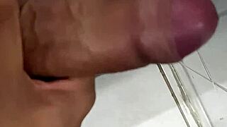 Close-up old cuckold husband strokes tasty solo handjob in bathroom