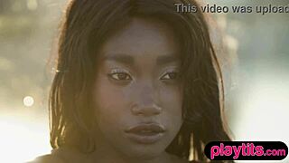petite ebony milf strips juicy tits poolside tease