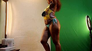 Sun flower tries on sexy bikinis showing off her oiled milf curves