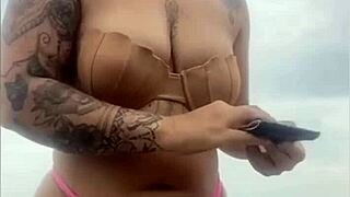 asking him to pull cock from shorts checks if it's really hard at beach