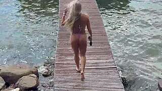 micro bikini barely covers her curves